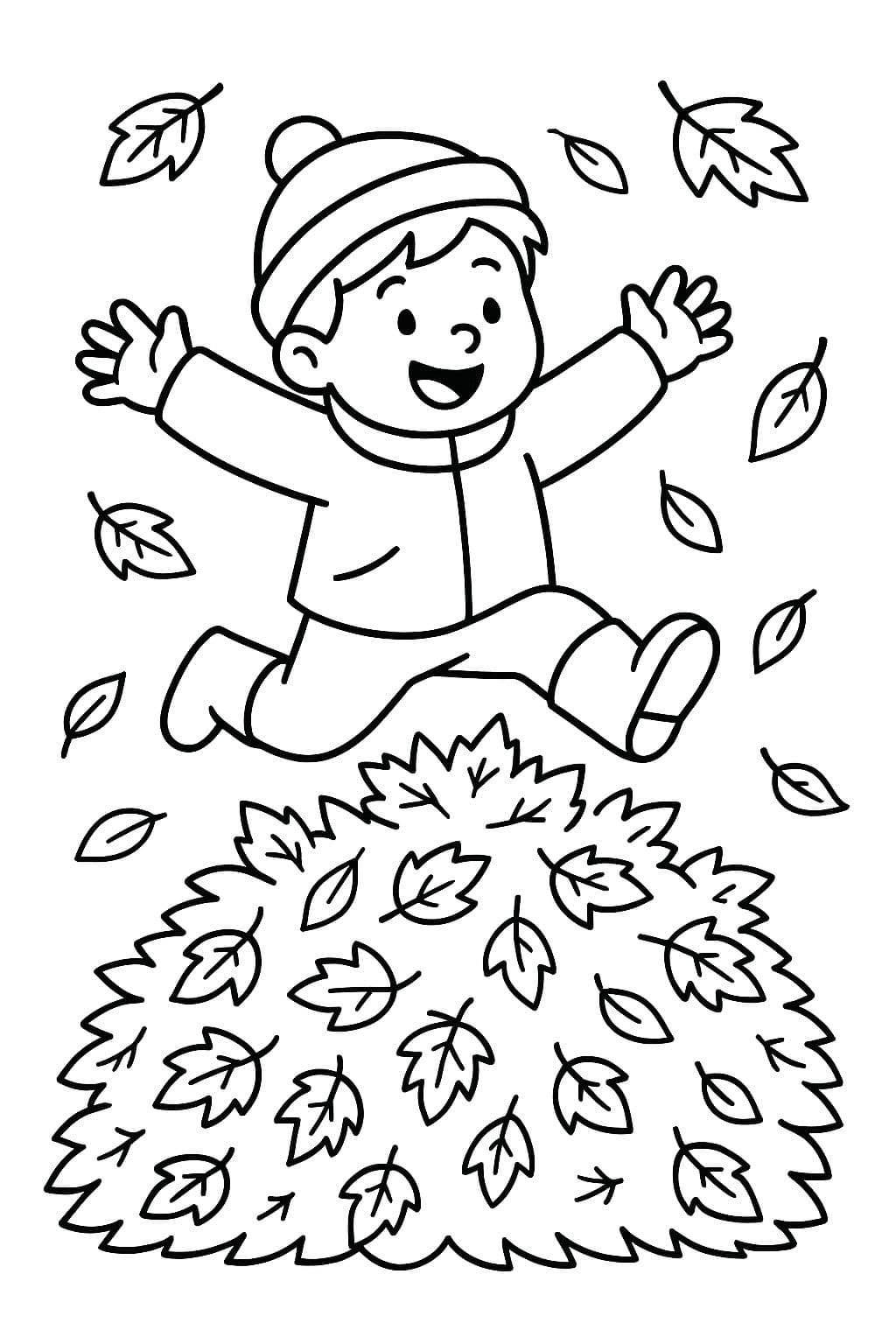 Enfant sautant dans un tas de feuilles